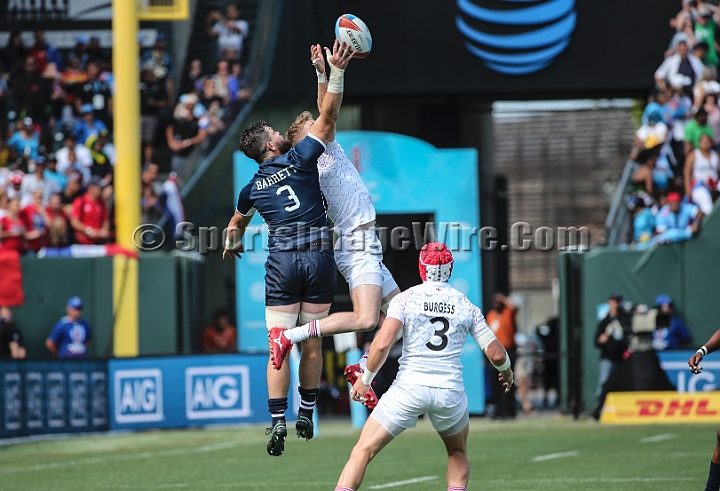 2018RugbySevensSat-28.JPG - United States player Danny Barrett (3) breaks up the throw in against England in the men's championship quarter finals of the 2018 Rugby World Cup Sevens, Saturday, July 21, 2018, at AT&T Park, San Francisco. England defeated USA 24-19 in sudden death play. (Spencer Allen/IOS via AP)